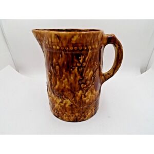 Bennington Rockingham Antique Yellow Ware Pottery Pitcher with Peacock Relief